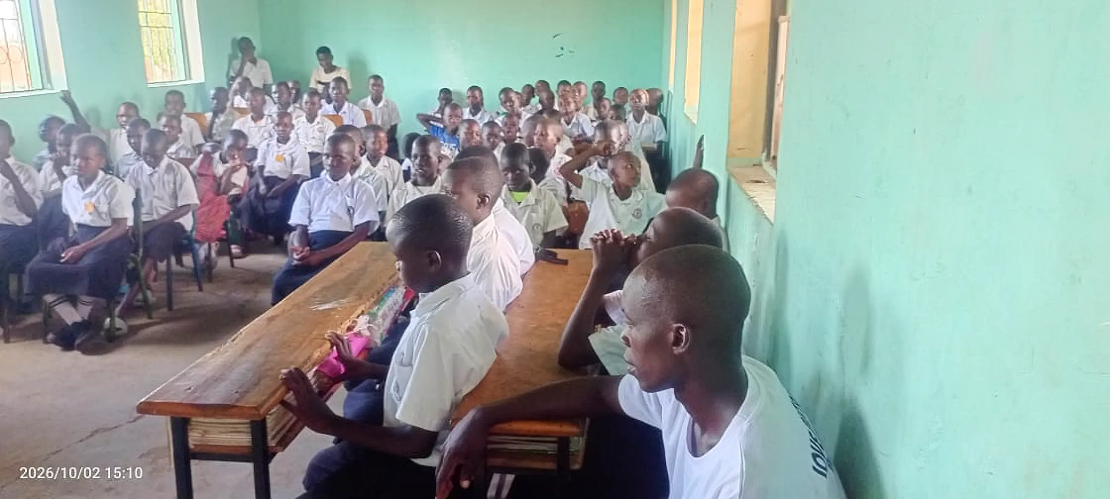 A pupil speaking during a debate club meeting