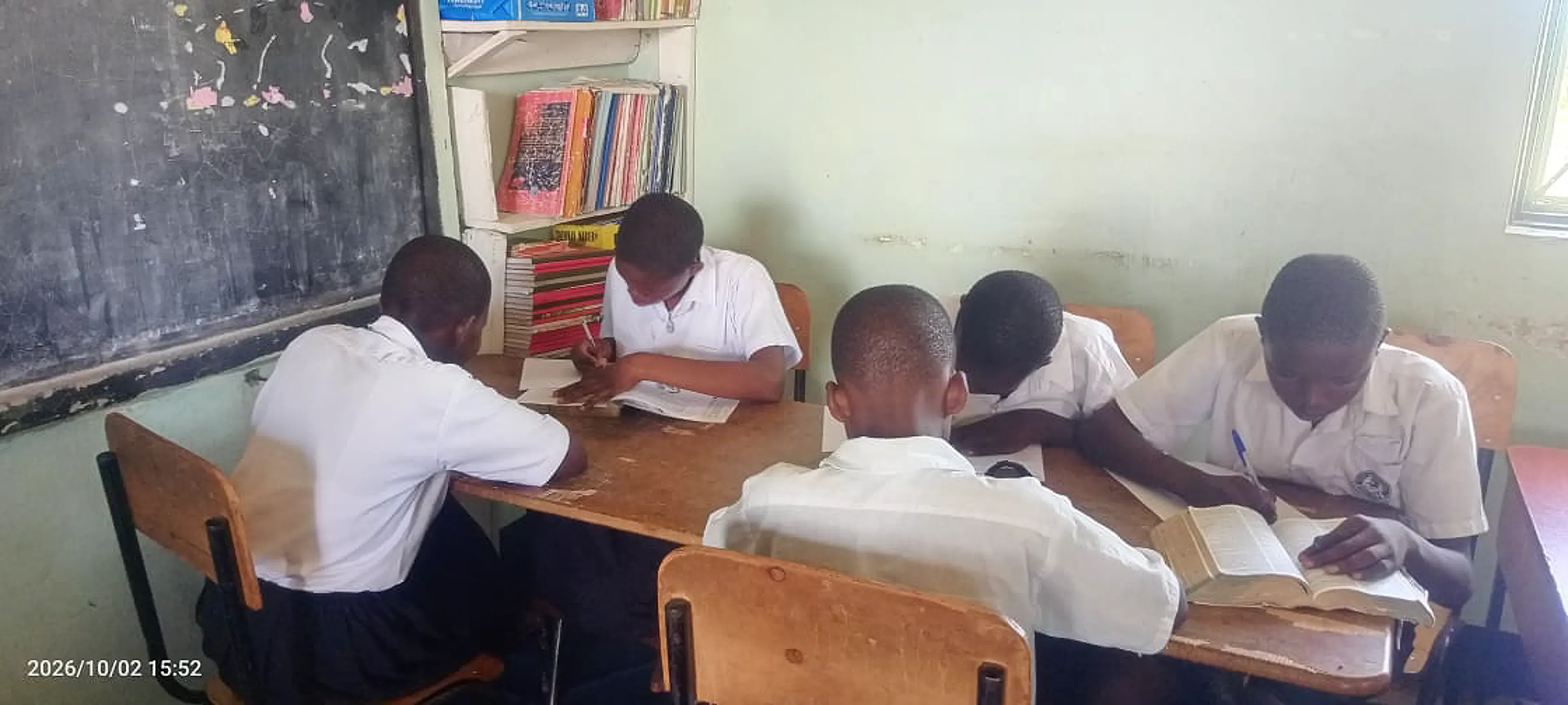 Pupils reading in the library corner